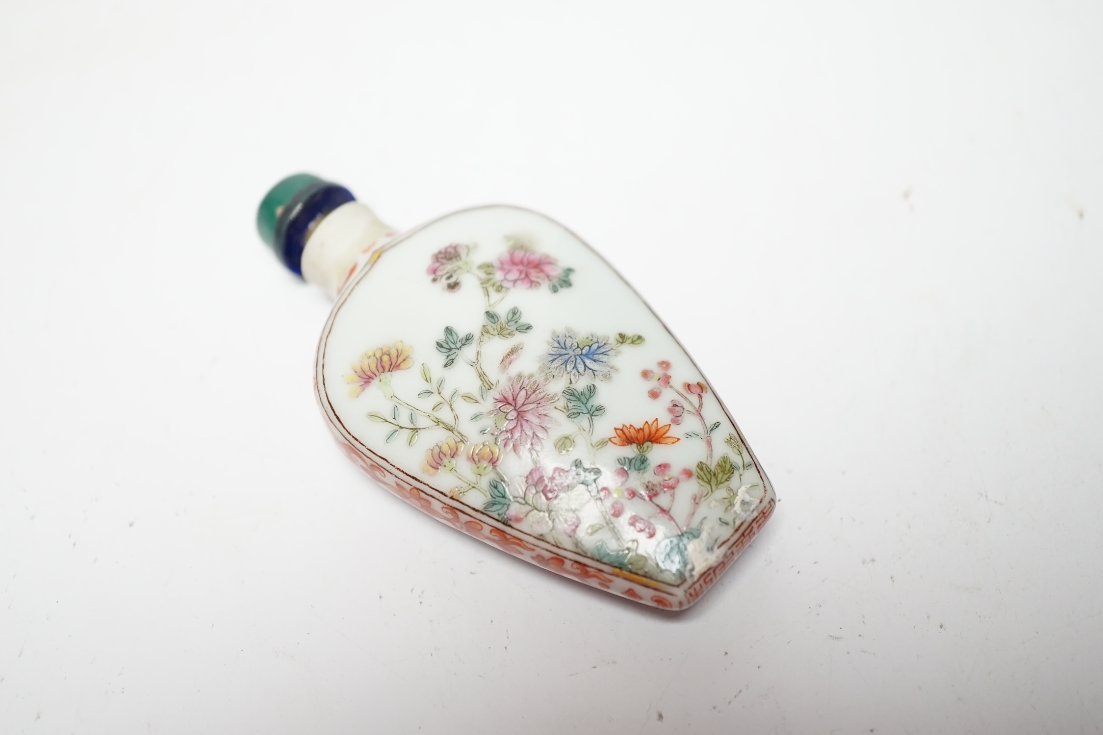 A Chinese famille rose snuff bottle, Jiaqing mark and of the period (1796-1820), rim ground off, 7cm high
